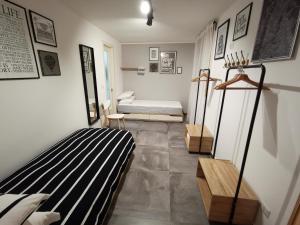 A bed or beds in a room at The black dog house