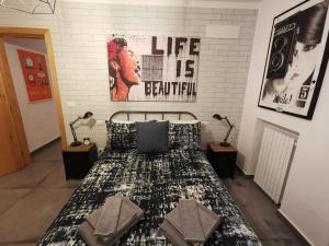 A bed or beds in a room at The black dog house