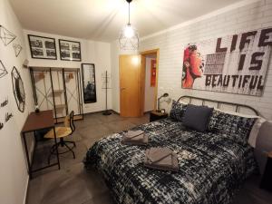 A bed or beds in a room at The black dog house