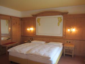 Postel nebo postele na pokoji v ubytování Park Hotel Aurora