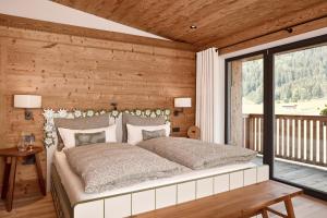 Postelja oz. postelje v sobi nastanitve Kitzbühel Lodge