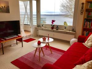Ein Sitzbereich in der Unterkunft Ferienwohnung Leuchtturm 21