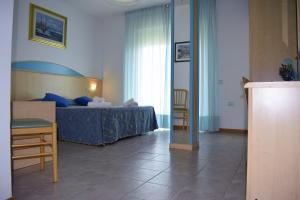Postel nebo postele na pokoji v ubytování Hotel Solemare - Frontemare - 3 Stelle Superior