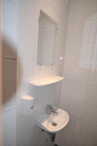 Koupelna v ubytování Hotel Bienvenue