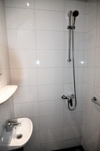Koupelna v ubytování Hotel Bienvenue