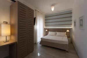 Postel nebo postele na pokoji v ubytování Boutique Hotel Ilio