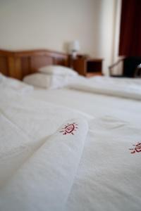 Postel nebo postele na pokoji v ubytování Well Hotel