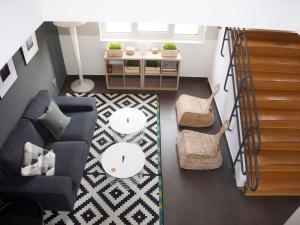 a living room with a couch and a table at Hotel Restaurante Cadosa in Soria