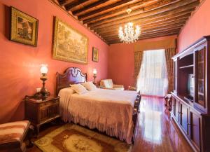 Posteľ alebo postele v izbe v ubytovaní Hotel Emblemático San Marcos