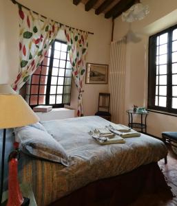 Letto o letti in una camera di Room & Breakfast Nel Borgo Scipione