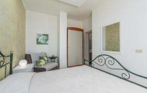 Postel nebo postele na pokoji v ubytování Apartment Complex Orzan Lovrecica