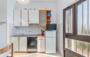 Kuchyň nebo kuchyňský kout v ubytování Apartment Complex Orzan Lovrecica