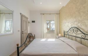 Postel nebo postele na pokoji v ubytování Apartment Complex Orzan Lovrecica