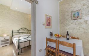 Postel nebo postele na pokoji v ubytování Apartment Complex Orzan Lovrecica