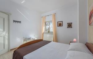 Postel nebo postele na pokoji v ubytování Apartment Complex Orzan Lovrecica