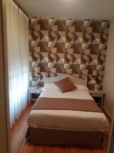 Cama o camas de una habitación en Hotel Arha Potes & Spa