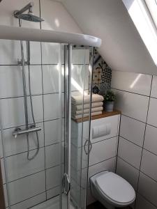 Ett badrum på Westfalische Apartments