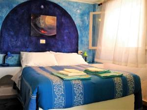 Letto o letti in una camera di Ierapetra La Luna Blu