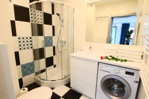 Kúpeľňa v ubytovaní Apartamenty Chwytowo 14