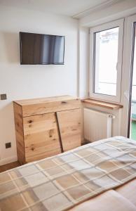 Postel nebo postele na pokoji v ubytování Saalbacher Perle Top 4