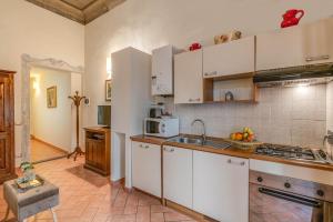 Kuchyň nebo kuchyňský kout v ubytování Dante States Apartments