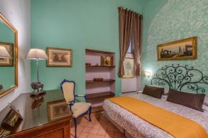 Postel nebo postele na pokoji v ubytování Dante States Apartments