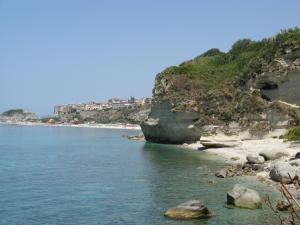 a view of a beach with rocks and the ocean at Villa Anna Tropea in Tropea +41 photos