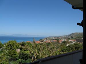 a view of the ocean from a balcony at Villa Anna Tropea in Tropea