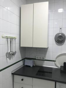 Kuchyň nebo kuchyňský kout v ubytování Santas Patronas Street center + 15 fotografií