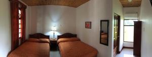 Voodi või voodid majutusasutuse Hotel Los Higuerones toas