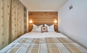 Posteľ alebo postele v izbe v ubytovaní Saalbacher Perle Top 4