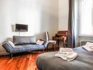 Posteľ alebo postele v izbe v ubytovaní Mecenate Rooms