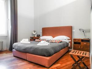 Posteľ alebo postele v izbe v ubytovaní Mecenate Rooms