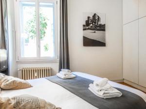 Posteľ alebo postele v izbe v ubytovaní Mecenate Rooms