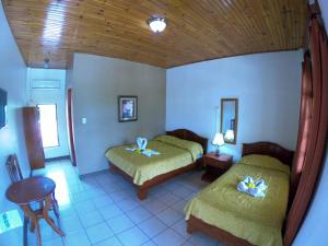 Voodi või voodid majutusasutuse Hotel Los Higuerones toas