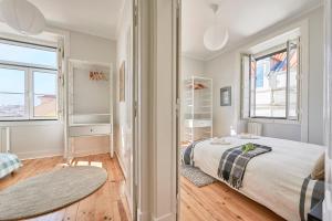 En eller flere senge i et værelse på Rua dos Remédios 179