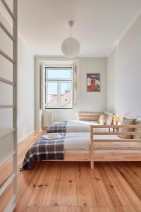 En eller flere senge i et værelse på Rua dos Remédios 179