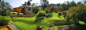 an aerial view of a house with a green yard at Hotel Casa en el Campo in Morelia