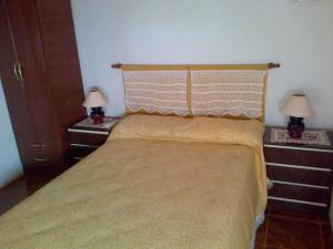 Una cama o camas en una habitación de Alojamiento Doña Zule