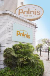 サン・ビセンテにあるPalais Hotelの建物脇のパジタスホテルサイン