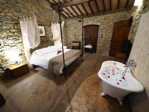 A bed or beds in a room at EcoResort Il Cantico della Natura