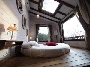 A bed or beds in a room at EcoResort Il Cantico della Natura