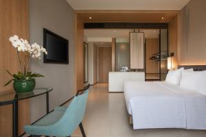 TV a/nebo společenská místnost v ubytování Hotel Santika Premiere Bandara Palembang