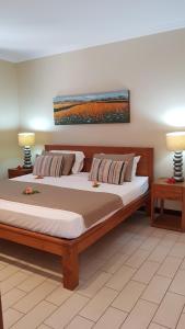 Postel nebo postele na pokoji v ubytování Eden Island Luxury Apartment - White Sand