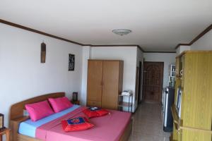 Ένα ή περισσότερα κρεβάτια σε δωμάτιο στο B&B View Talay 1B by Franco Jontiem +52 φωτογραφίες