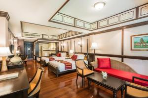 Postel nebo postele na pokoji v ubytování Wora Bura Hua Hin Resort & Spa