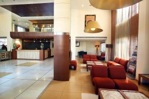 Posezení v ubytování Harrisons Hotel