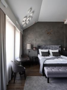 Postel nebo postele na pokoji v ubytování Lapland Hotels Bulevardi
