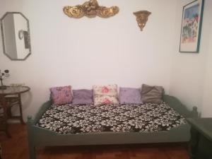 Posteľ alebo postele v izbe v ubytovaní Violetta apartmanlakás