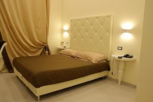 Postel nebo postele na pokoji v ubytování Hotel Columbia Wellness & Spa